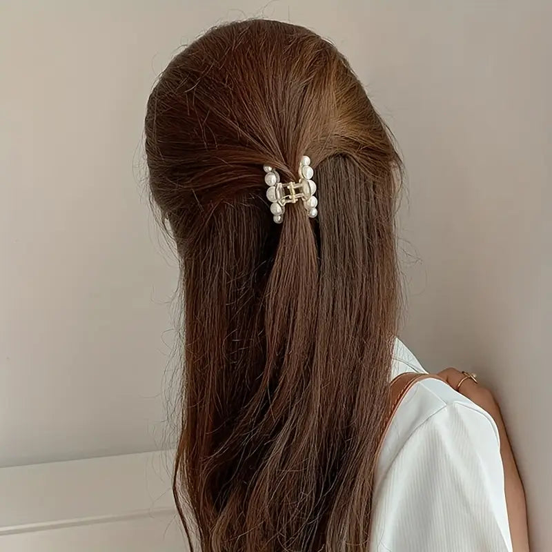 Small pearl clutcher